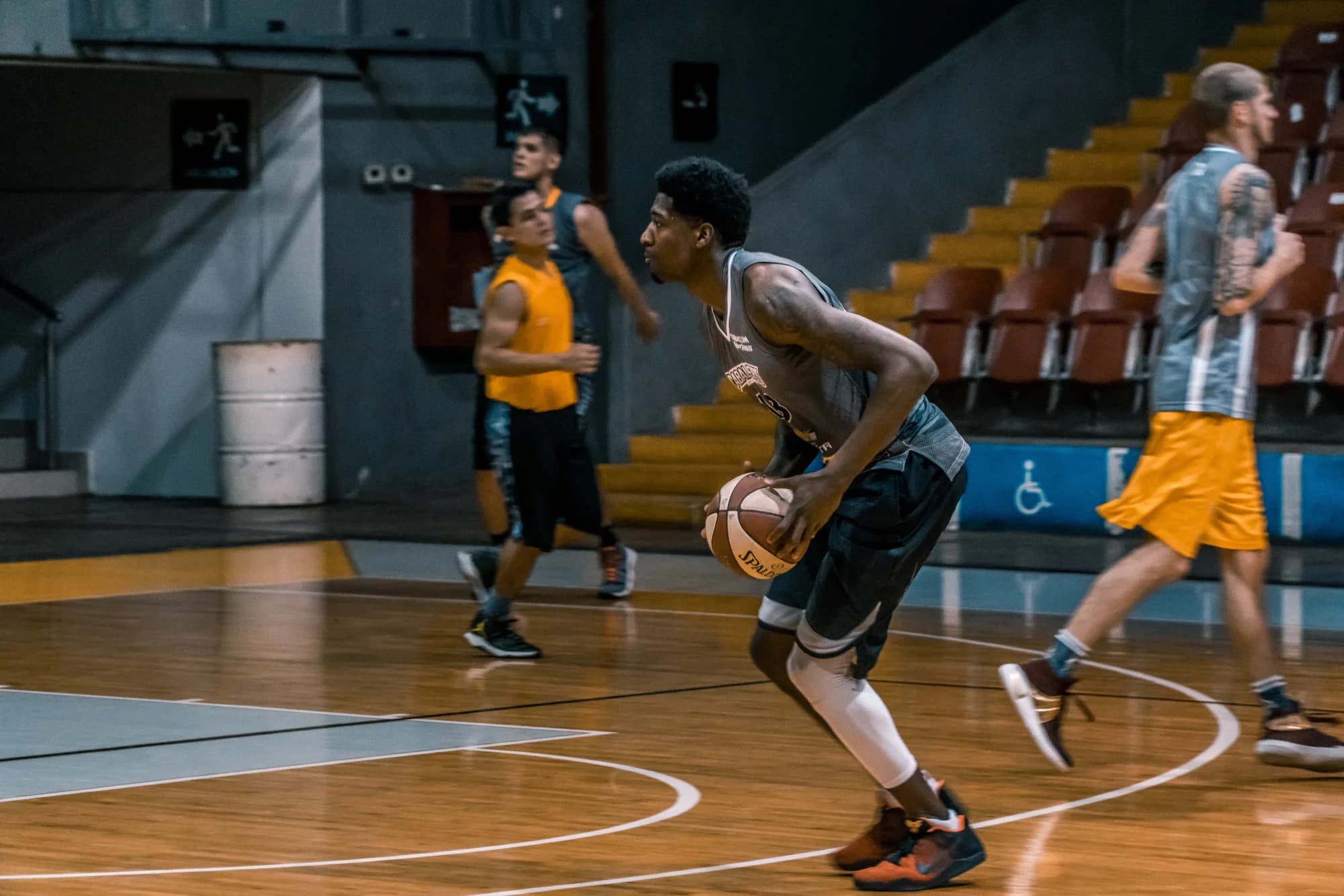 Basketball team preparing on court